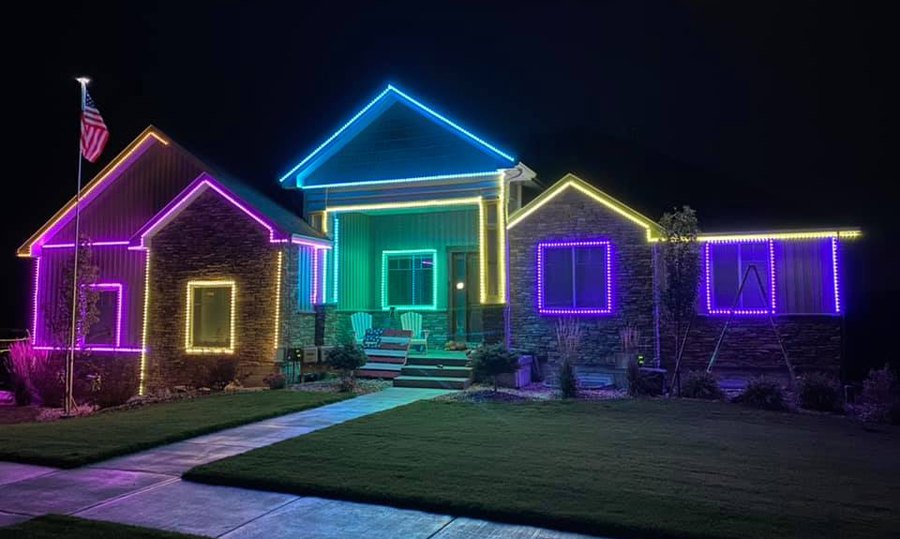 The Robinson family home outlined in blue, purple, yellow and green lights in 2021